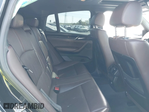 2015 BMW X4 xDrive35i with VIN 5UXXW5C50F0E87728, listed as a IAAI auction lot 41819628 with 136,042 mi miles and . Bid and sale history available at DreamBid. Image 8.