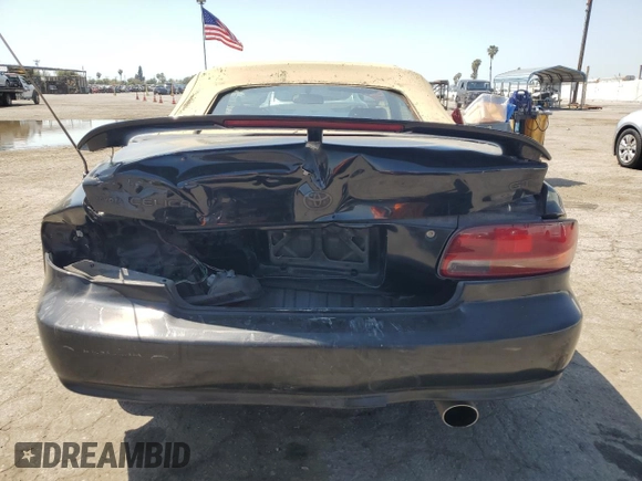 1997 Toyota Celica GT z VIN JT5FG02TXV0044202, wystawiony jako Copart lot #52166575 z przebiegiem 167 292 mil mil oraz Szkoda całkowita • Salvage title. Historia ofert i sprzedaży dostępna na DreamBid. Obrazek 6.