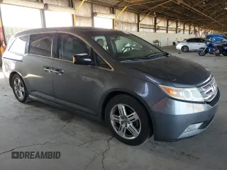2012 Honda Odyssey Touring с VIN 5FNRL5H91CB138389, выставлен на аукционе Copart как лот 61137135 с пробегом 161 468 миль миль и Чистый • Clean title. История ставок и продаж доступна на DreamBid. Изображение 4.