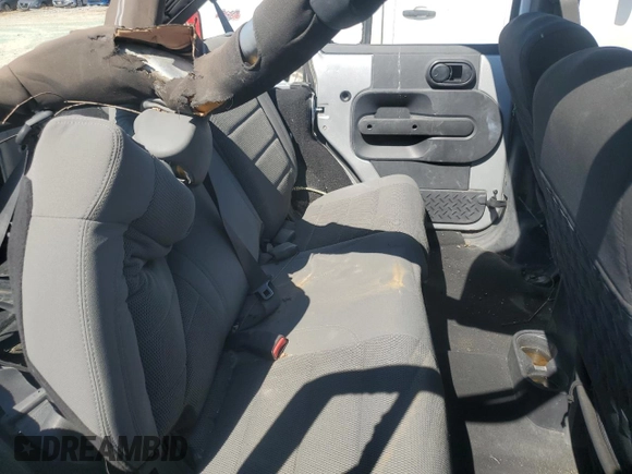 2007 Jeep Wrangler Unlimited Sahara with VIN 1J4GA59147L207482, listed as a Copart auction lot 55666615 with 151,525 mi miles and Salvage title. Bid and sale history available at DreamBid. Image 11.