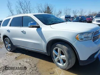 2013 Dodge Durango Citadel z VIN 1C4RDJEG6DC638023, wystawiony jako IAAI lot #41761307 z przebiegiem 405 864 mil mil oraz . Historia ofert i sprzedaży dostępna na DreamBid. Obrazek 13.