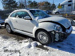 2013 Volkswagen Beetle 2.5L with VIN 3VWJP7AT9DM687870, listed as a Copart auction lot 87934875 with 91,557 mi miles and Salvage Title. Bid and sale history available at DreamBid. Image 4.
