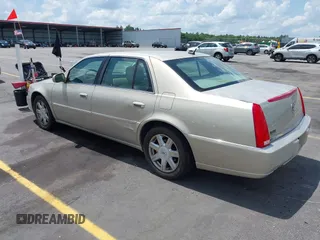 2008 Cadillac DTS 1SC with VIN 1G6KD57Y38U100381, listed as a IAAI auction lot 42173059 with 146,669 mi miles and . Bid and sale history available at carsss.com. Image 3.