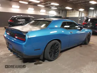 2016 Dodge Challenger R/T Scat Pack with VIN 2C3CDZFJ8GH279312, listed as a IAAI auction lot 41922402 with 21,168 mi miles and . Bid and sale history available at DreamBid. Image 4.