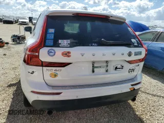2019 Volvo XC60 Momentum with VIN YV4A22RK5K1383510, listed as a Copart auction lot 77253384 with Not provided miles and Salvage title. Bid and sale history available at DreamBid. Image 6.