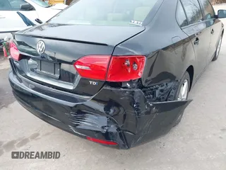2012 Volkswagen Jetta TDI w/Premium with VIN 3VWLL7AJXCM073394, listed as a IAAI auction lot 41602574 with 159,668 mi miles and . Bid and sale history available at DreamBid. Image 17.