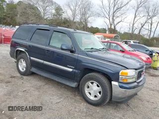 2005 GMC Yukon SLT with VIN 1GKEC13T35J206492, listed as a IAAI auction lot 41714271 with 200,178 mi miles. Bid and sale history available at carsss.com. Image 1.