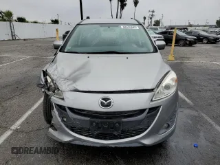 2012 Mazda 5 Touring with VIN JM1CW2CL8C0121599, listed as a Copart auction lot 50520895 with 131,948 mi miles and Salvage title. Bid and sale history available at DreamBid. Image 5.