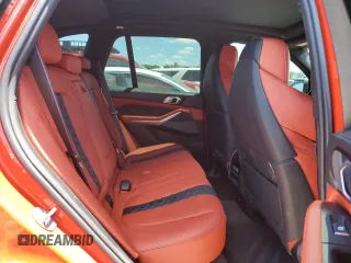 2023 BMW X5 M z VIN 5YMJU0C07P9P13978, wystawiony jako Copart lot #49664573 z przebiegiem Nie podano mil oraz . Historia ofert i sprzedaży dostępna na DreamBid. Obrazek 11.