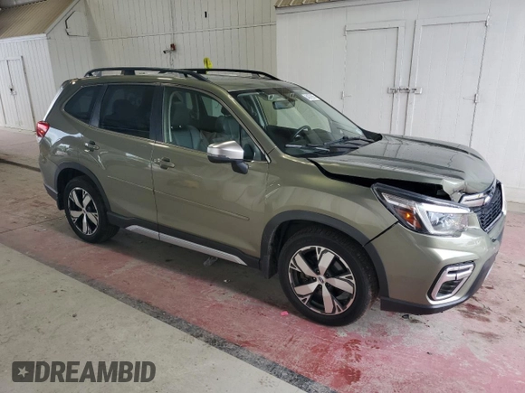 2021 Subaru Forester Touring with VIN JF2SKAXC1MH481717, listed as a Copart auction lot 64078355 with 62,104 mi miles and Salvage title. Bid and sale history available at DreamBid. Image 4.