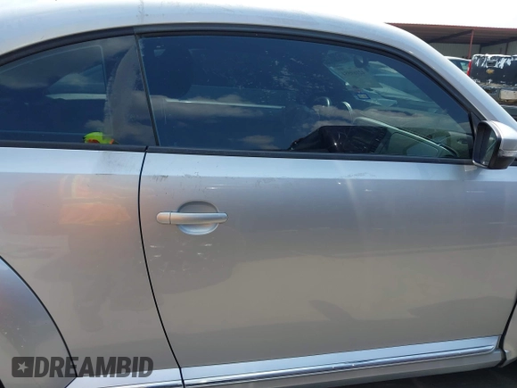 2013 Volkswagen Beetle 2.5L with VIN 3VWJX7AT7DM673319, listed as a IAAI auction lot 42169554 with 128,622 mi miles and . Bid and sale history available at DreamBid. Image 14.