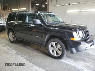 2014 Jeep Patriot Latitude with VIN 1C4NJPFB0ED890696, listed as a Copart auction lot 55581825 with 70,030 mi miles and Salvage title. Bid and sale history available at DreamBid. Image 4.