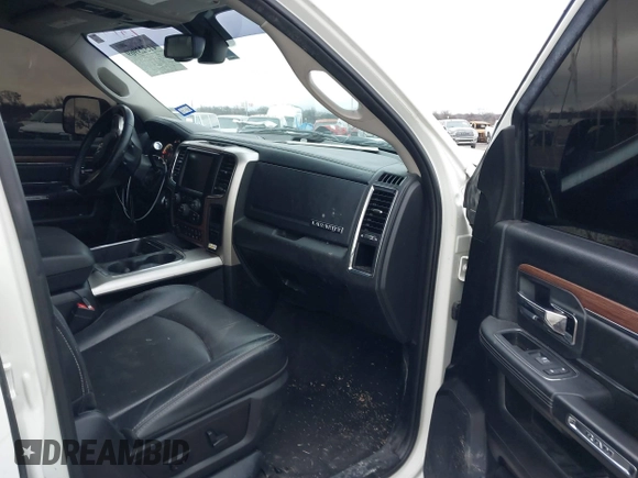 2017 Ram 2500 Laramie z VIN 3C6UR5FL7HG749723, wystawiony jako IAAI lot #41523969 z przebiegiem 133 622 mil mil oraz . Historia ofert i sprzedaży dostępna na DreamBid. Obrazek 5.