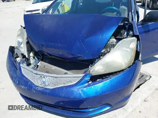 2009 Honda Fit with VIN JHMGE88249S056575, listed as a IAAI auction lot 41702555 with 116,658 mi miles. Bid and sale history available at carsss.com. Image 6.