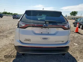 2017 Ford Edge Titanium z VIN 2FMPK4K87HBC26173, wystawiony jako Copart lot #58070565 z przebiegiem 63 989 mil mil oraz Szkoda całkowita • Salvage title. Historia ofert i sprzedaży dostępna na DreamBid. Obrazek 6.
