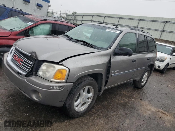 2006 GMC Envoy SLT with VIN 1GKDT13S262141598, listed as a Copart auction lot 45374304 with 258,039 mi miles and Salvage Title. Bid and sale history available at carsss.com. Image 1.