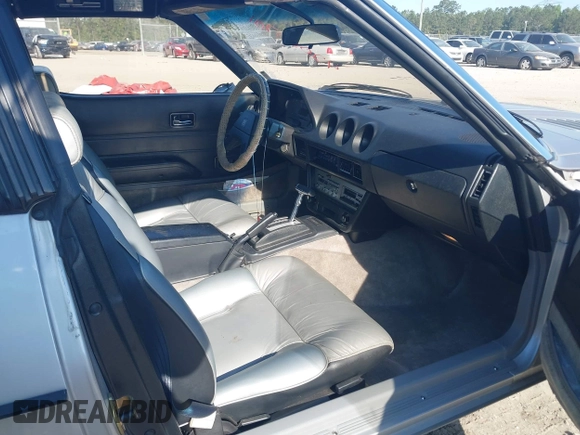 1983 Datsun 280ZX z VIN JN1HZ04S3DX562060, wystawiony jako IAAI lot #42063701 z przebiegiem 35 754 mil mil oraz . Historia ofert i sprzedaży dostępna na DreamBid. Obrazek 5.
