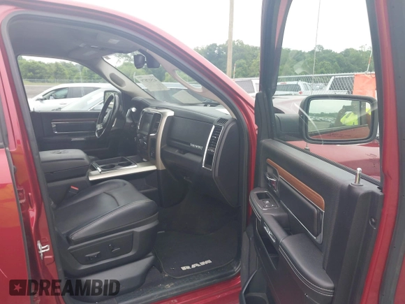 2014 Ram 2500 Laramie with VIN 3C6UR5NJ1EG276591, listed as a IAAI auction lot 42517879 with 145,466 mi miles and . Bid and sale history available at DreamBid. Image 5.