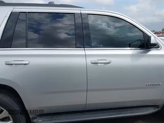 2019 Chevrolet Tahoe LT with VIN 1GNSCBKC7KR326466, listed as a IAAI auction lot 42048492 with 65,913 mi miles and . Bid and sale history available at DreamBid. Image 14.