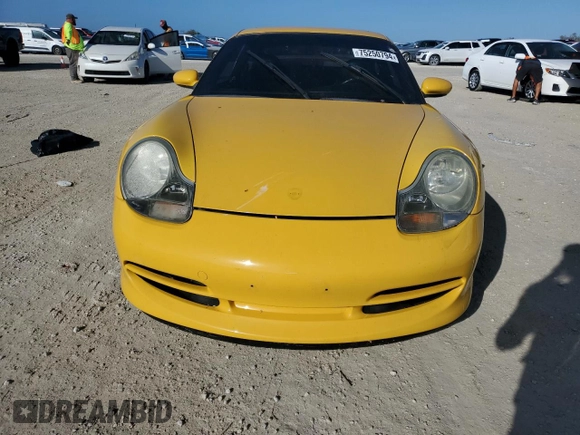 2000 Porsche 911 z VIN WP0AA2992YS622632, wystawiony jako Copart lot #75250794 z przebiegiem Nie podano mil oraz Szkoda całkowita • Salvage title. Historia ofert i sprzedaży dostępna na DreamBid. Obrazek 5.