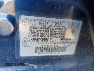 2013 Nissan Versa S Plus z VIN 3N1CN7AP0DL862116, wystawiony jako Copart lot #41641525 z przebiegiem 94 231 mil mil oraz Szkoda całkowita • Salvage title. Historia ofert i sprzedaży dostępna na DreamBid. Obrazek 13.