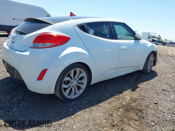 2013 Hyundai Veloster w/Gray Int with VIN KMHTC6AD1DU165476, listed as a IAAI auction lot 42242540 with 201,732 mi miles and . Bid and sale history available at DreamBid. Image 4.