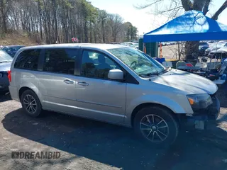 2017 Dodge Grand Caravan SE with VIN 2C4RDGBG9HR732854, listed as a IAAI auction lot 41980430 with 124,726 mi miles and . Bid and sale history available at DreamBid. Image 13.