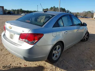2015 Chevrolet Cruze LT with VIN 1G1PC5SBXF7123458, listed as a IAAI auction lot 41770187 with 153,477 mi miles. Bid and sale history available at carsss.com. Image 4.