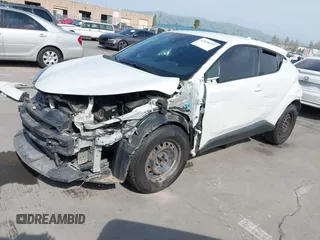 2018 Toyota C-HR XLE z VIN NMTKHMBX4JR049041, wystawiony jako IAAI lot #42038397 z przebiegiem 74 930 mil mil oraz . Historia ofert i sprzedaży dostępna na DreamBid. Obrazek 19.