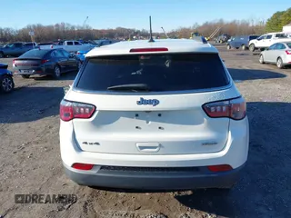 2020 Jeep Compass Latitude with VIN 3C4NJDBB2LT115599, listed as a IAAI auction lot 40970548 with 63,349 mi miles. Bid and sale history available at carsss.com. Image 16.