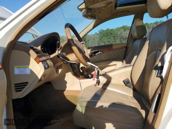 2007 Mercedes-Benz E 550 with VIN WDBUF72X37B021084, listed as a Copart auction lot 48695235 with 119,538 mi miles and Salvage Title. Bid and sale history available at DreamBid. Image 7.