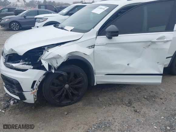 2020 Volkswagen Tiguan SE with VIN 3VV2B7AX1LM151388, listed as a IAAI auction lot 41480146 with 154,567 mi miles. Bid and sale history available at carsss.com. Image 6.