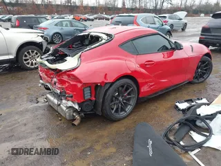 2024 Toyota GR Supra 3.0 with VIN WZ1DB0G05RW066637, listed as a IAAI auction lot 41572854 with 4,439 mi miles. Bid and sale history available at carsss.com. Image 4.
