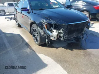 2017 Ford Taurus SHO with VIN 1FAHP2KT5HG103473, listed as a IAAI auction lot 41764499 with 58,436 mi miles and . Bid and sale history available at DreamBid. Image 6.