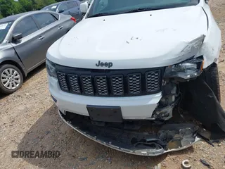 2019 Jeep Grand Cherokee Altitude z VIN 1C4RJEAG7KC533316, wystawiony jako IAAI lot #42471064 z przebiegiem 142 299 mil mil oraz . Historia ofert i sprzedaży dostępna na DreamBid. Obrazek 12.