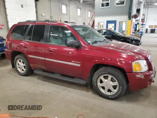 2006 GMC Envoy SLE z VIN 1GKDT13S062263876, wystawiony jako Copart lot #60245185 z przebiegiem 156 567 mil mil oraz Czysty tytuł • Clean title. Historia ofert i sprzedaży dostępna na DreamBid. Obrazek 4.
