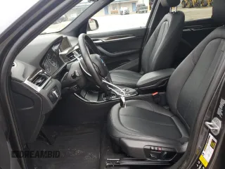 2016 BMW X1 xDrive28i with VIN WBXHT3C32G5E47921, listed as a Copart auction lot 51738135 with 134,734 mi miles and Salvage Title. Bid and sale history available at carsss.com. Image 7.