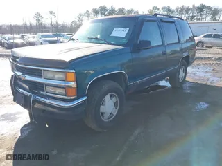 1996 Chevrolet Tahoe with VIN 1GNEK13R9TJ392739, listed as a IAAI auction lot 41559513 with 257,457 mi miles. Bid and sale history available at carsss.com. Image 2.