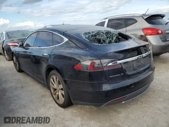 2016 Tesla Model S 90D с VIN 5YJSA1E27GF125739, выставлен на аукционе Copart как лот 75074624 с пробегом Не указан миль и Списание • Salvage title. История ставок и продаж доступна на DreamBid. Изображение 2.