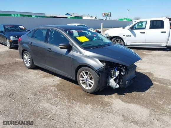 2017 Ford Focus SE with VIN 1FADP3F23HL202077, listed as a IAAI auction lot 41749975 with 67,736 mi miles. Bid and sale history available at carsss.com. Image 1.