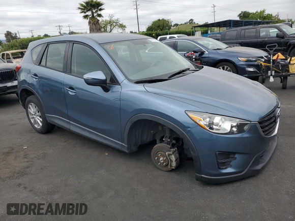 2016 Mazda CX-5 Sport with VIN JM3KE2BY4G0789618, listed as a Copart auction lot 53318245 with 52,801 mi miles and Salvage Title. Bid and sale history available at carsss.com. Image 4.