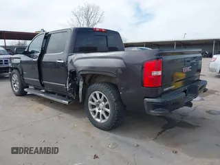 2015 GMC Sierra 1500 Denali with VIN 3GTU2WEJ2FG509236, listed as a IAAI auction lot 41771790 with 219,043 mi miles. Bid and sale history available at carsss.com. Image 3.