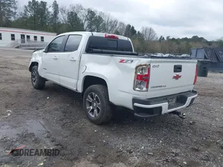 2020 Chevrolet Colorado 4WD Z71 with VIN 1GCGTDEN6L1228309, listed as a IAAI auction lot 41865357 with 100,560 mi miles and . Bid and sale history available at DreamBid. Image 3.