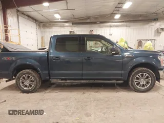 2018 Ford F-150 XL with VIN 1FTEW1EP4JFA00923, listed as a IAAI auction lot 41506293 with 153,523 mi miles and . Bid and sale history available at DreamBid. Image 13.