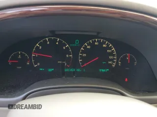 2004 Cadillac DeVille DTS z VIN 1G6KF579X4U212415, wystawiony jako Copart lot #58005555 z przebiegiem 97 663 mil mil oraz Tytuł czysty. Historia ofert i sprzedaży dostępna na DreamBid. Obrazek 9.