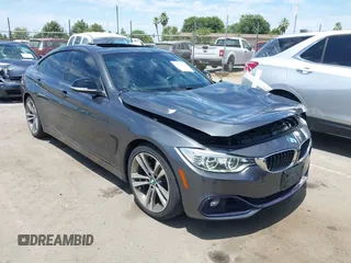 2015 BMW 4 Series 428i z VIN WBA4A5C59FG052596, wystawiony jako IAAI lot #42649927 z przebiegiem 68 842 mil mil oraz . Historia ofert i sprzedaży dostępna na DreamBid. Obrazek 1.