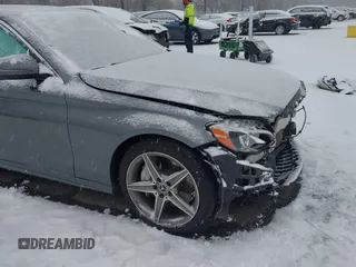 2017 Mercedes-Benz C 300 with VIN 55SWF4KB3HU215771, listed as a IAAI auction lot 41229717 with 66,676 mi miles and . Bid and sale history available at DreamBid. Image 6.