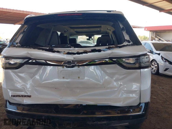 2020 Chevrolet Traverse Premier with VIN 1GNERKKW3LJ117912, listed as a IAAI auction lot 42317330 with 113,576 mi miles and . Bid and sale history available at DreamBid. Image 16.