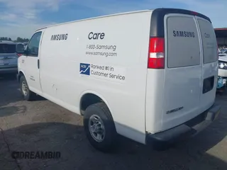 2019 Chevrolet Express Cargo Van with VIN 1GCWGAFP0K1170744, listed as a IAAI auction lot 42076354 with 218,813 mi miles. Bid and sale history available at carsss.com. Image 3.