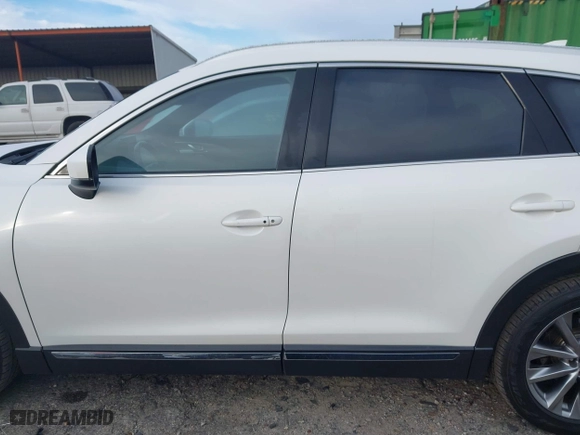 2016 Mazda CX-9 Grand Touring with VIN JM3TCBDY3G0116309, listed as a IAAI auction lot 40890199 with 64,948 mi miles. Bid and sale history available at carsss.com. Image 15.